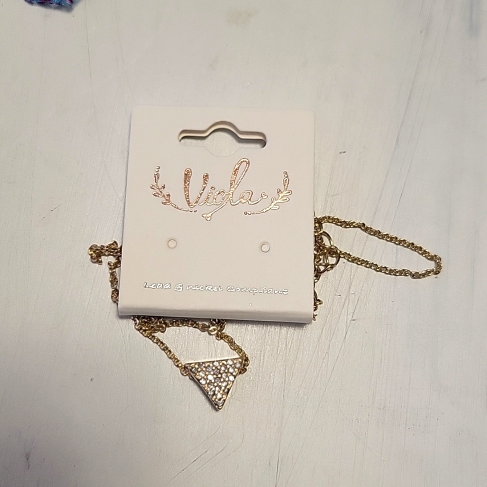 Viola golden colored triangle necklace